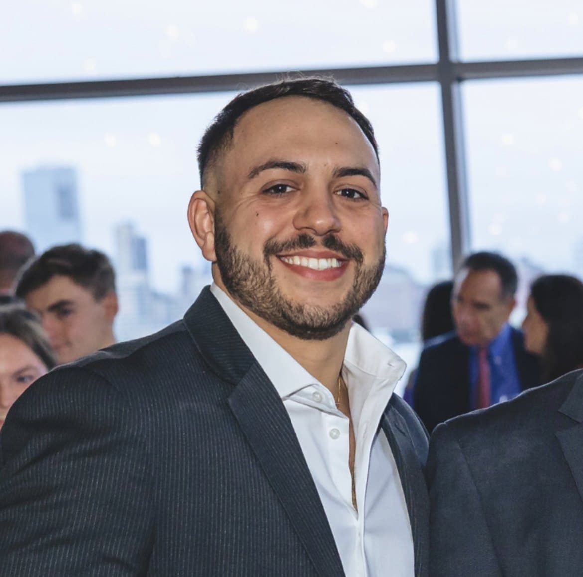 Scad — ScadMeta Scad, publicly known as ScadMeta (@ScadMeta), in a grey suit and open white shirt